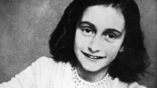 A file picture released in 1959 shows a portrait of Anne Frank who died of typhus in the Bergen-Belsen concentration camp in May 1945 at the age of 15