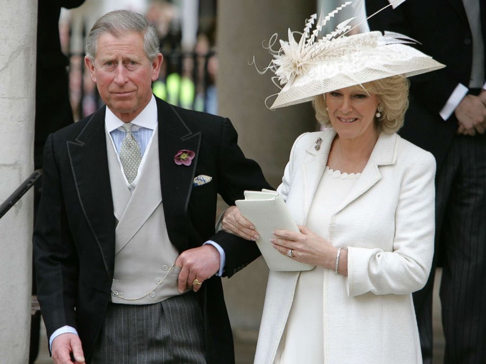 PHOTO: Prince Charles and his wife Camilla, the Duchess of Cornwall, depart the Civil Ceremony where they were legally married, at the Guildhall, Windsor on April 9, 2005 in Berkshire, England.
