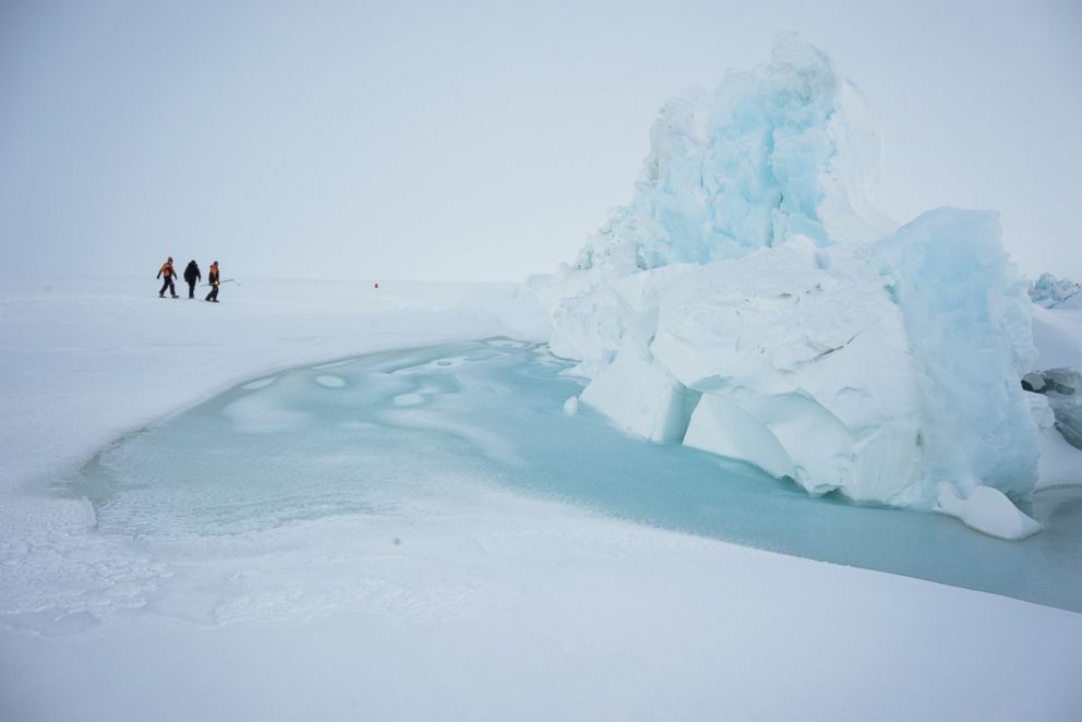 PHOTO: Scientists and base staff walk through pressure ridges in sea ice just outside of Scott Base the New Zealand Antarctic research facility near Mount Erebus, Nov. 21, 2015.