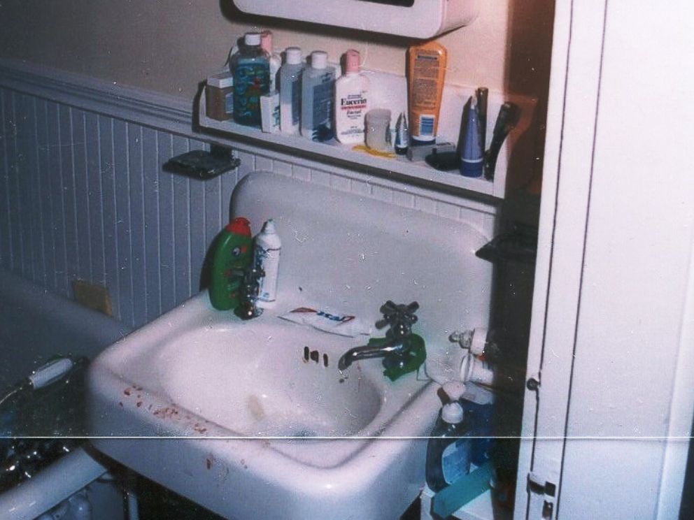 Crime scene photo showing a sink with bloody fingerprints inside Christa Worthingtons home. 