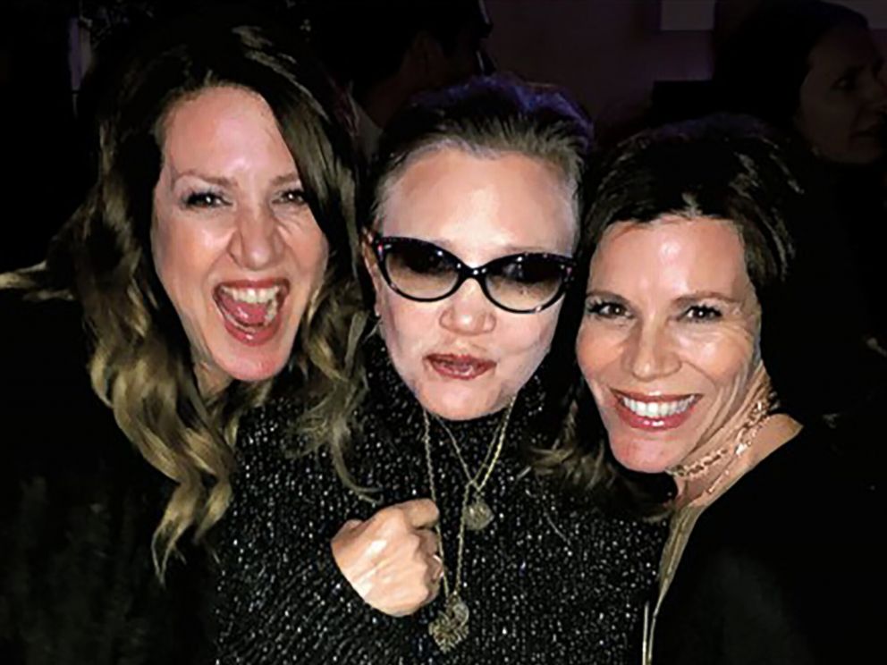 PHOTO: Joely Fisher, left, poses with her sisters Carrie Fisher, center, and Tricia Fisher, right.