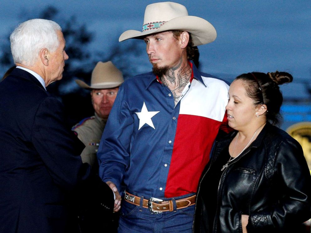 PHOTO: Vice President Mike Pence shakes hands with Johnnie Langendorff, who was one of the heroes that chased the assailant, near the site of the shooting at the First Baptist Church of Sutherland Springs in Sutherland Springs, Texas, Nov. 8, 2017.