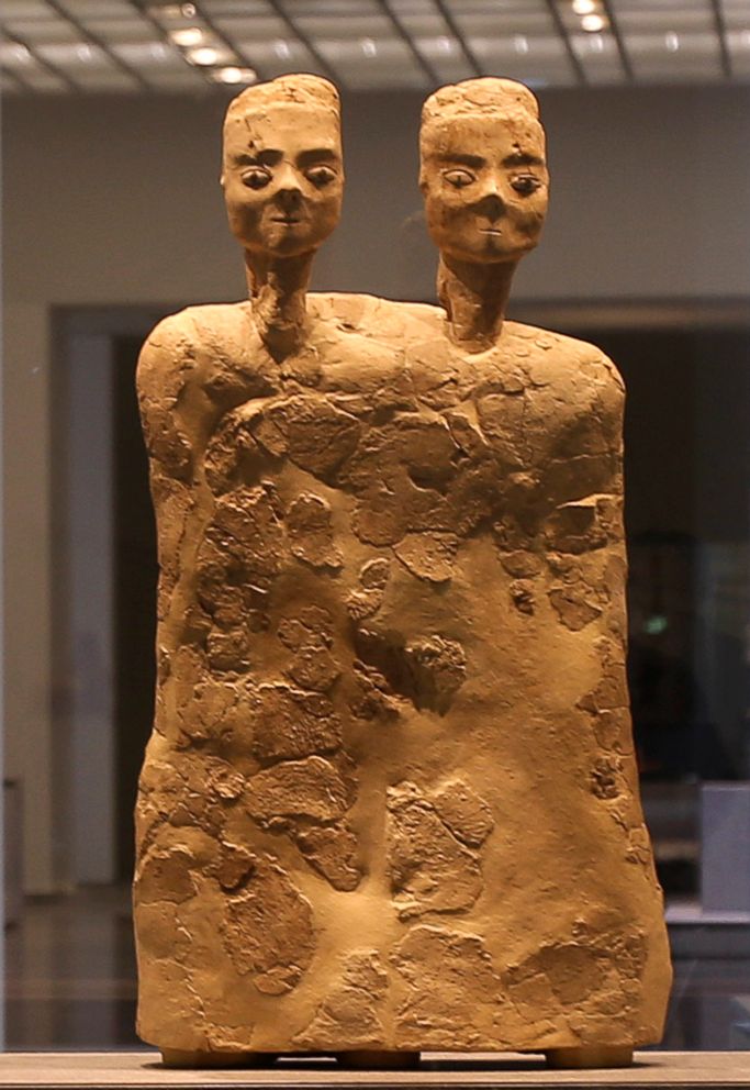 PHOTO: Monumental Statue with two heads from Jordan about 6500 BCE, is displayed at the new Louvre Museum in Abu Dhabi.