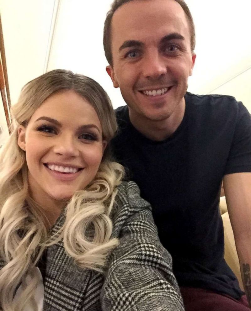 PHOTO: Frankie Muniz and his partner Witney Carson aboard the flight to New York.