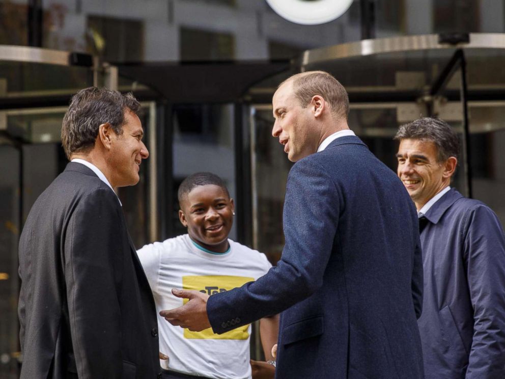 Prince William (2R) chats with British entrepreneur Brent Hoberman (L), anti-cyber bullying campaigner James Okulaja (2L) and Googles EMEA president of business operations, Matt Brittin, at the London headquarters, Nov. 16, 2017.