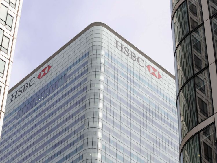 The logo of the HSBC bank is seen at its UK headquarters at Canary Wharf in London