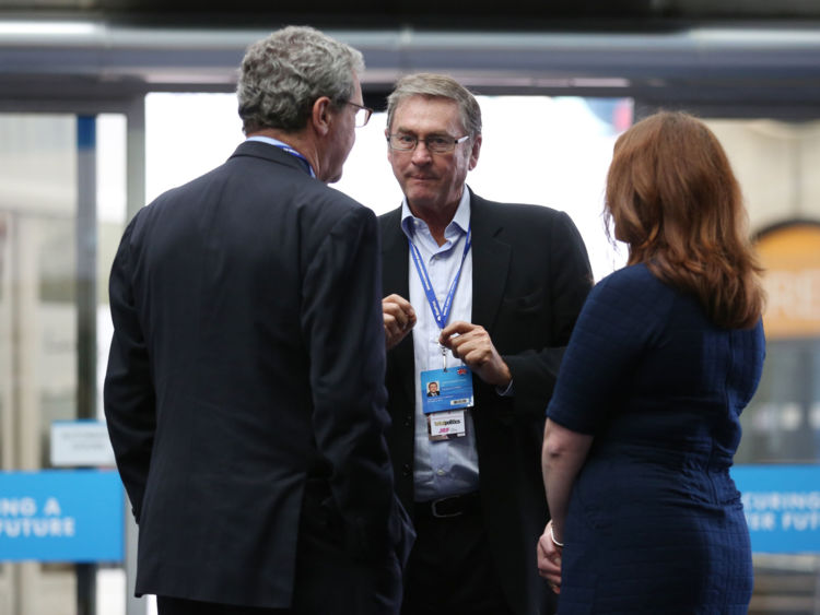 Lord Ashcroft, centre, during the Conservative Party Conference in 2014