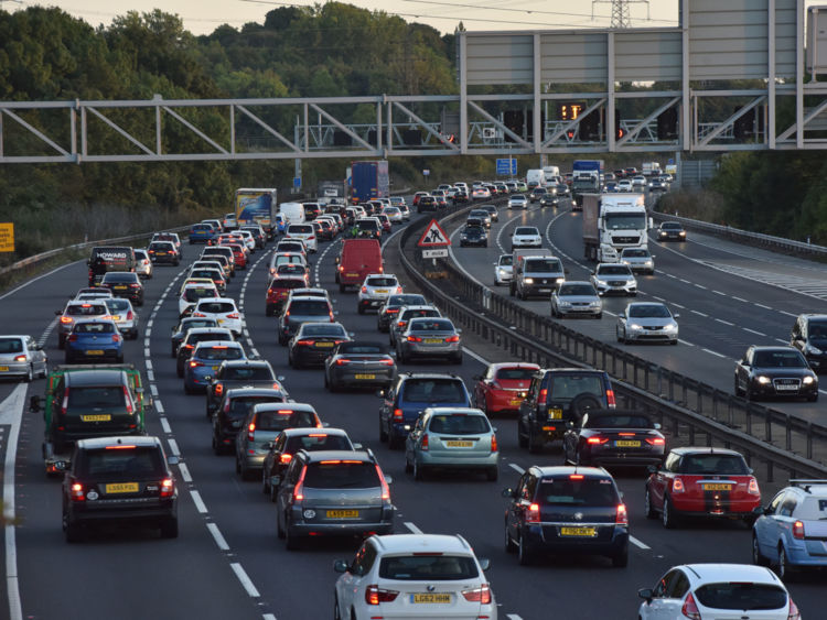 Bedford, UK - October 2nd 2016:Busy traffic on the M1 motorway freeway in England near Toddington Services The M1 is UK’s main roadway from north to south