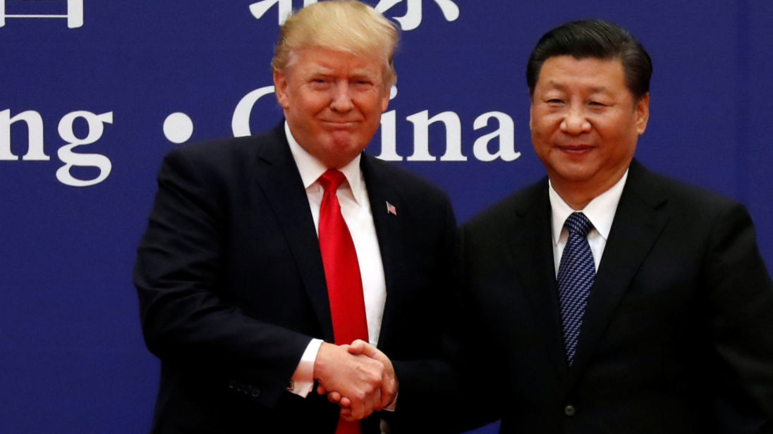 U.S. President Donald Trump and China's President Xi Jinping meet business leaders at the Great Hall of the People in Beijing, China, November 9, 2017