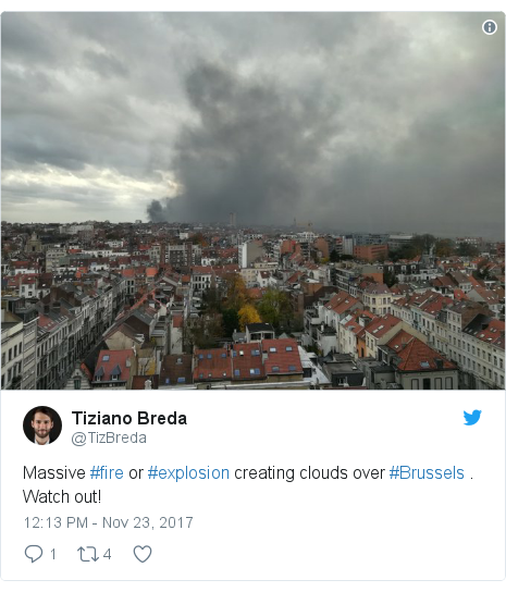 Twitter post by @TizBreda: Massive #fire or #explosion creating clouds over #Brussels . Watch out! 