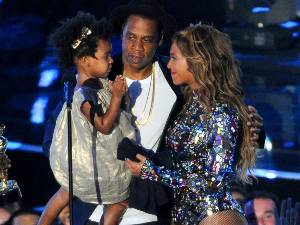 PHOTO: Beyonce on stage with Jay Z and their daughter Blue Ivy as she accepts the Video Vanguard Award at the MTV Video Music Awards in Inglewood, Calif., Aug. 24, 2014.