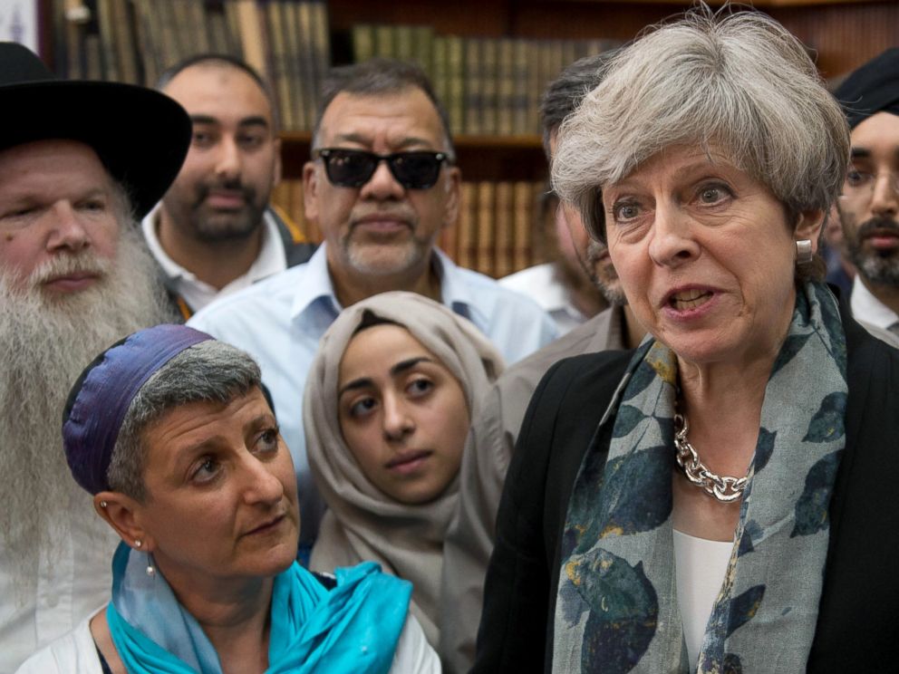 PHOTO: British Prime Minister Theresa May talks to faith leaders at Finsbury Park Mosque, June 19, 2017, in London.