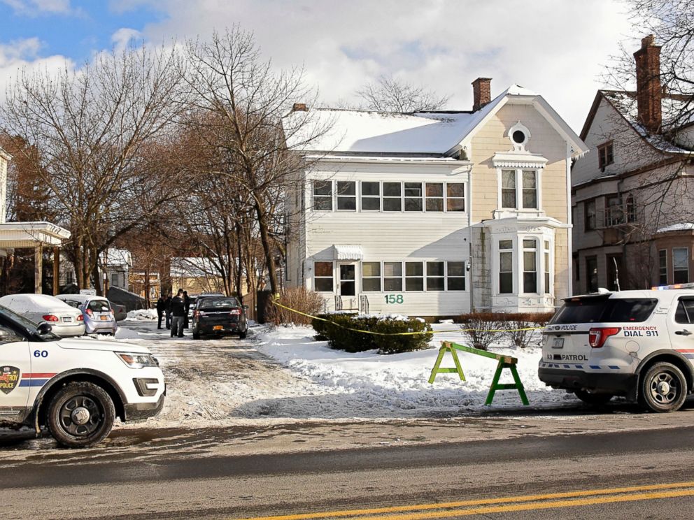 Troy police investigate multiple deaths at 158 Second Ave. on Tuesday, Dec. 26, 2017, in Troy, N.Y. Police say four people have been found dead and may have been killed in an apartment in New Yorks capital region. The bodies were discovered Tuesday 