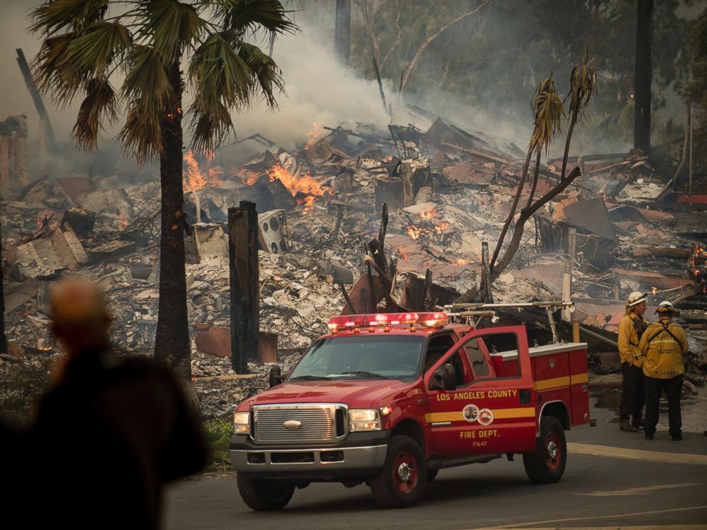 An apartment complex burns as a wildfire rages in Ventura, Calif., on Tuesday, Dec. 5, 2017. (AP Photo/Noah Berger)