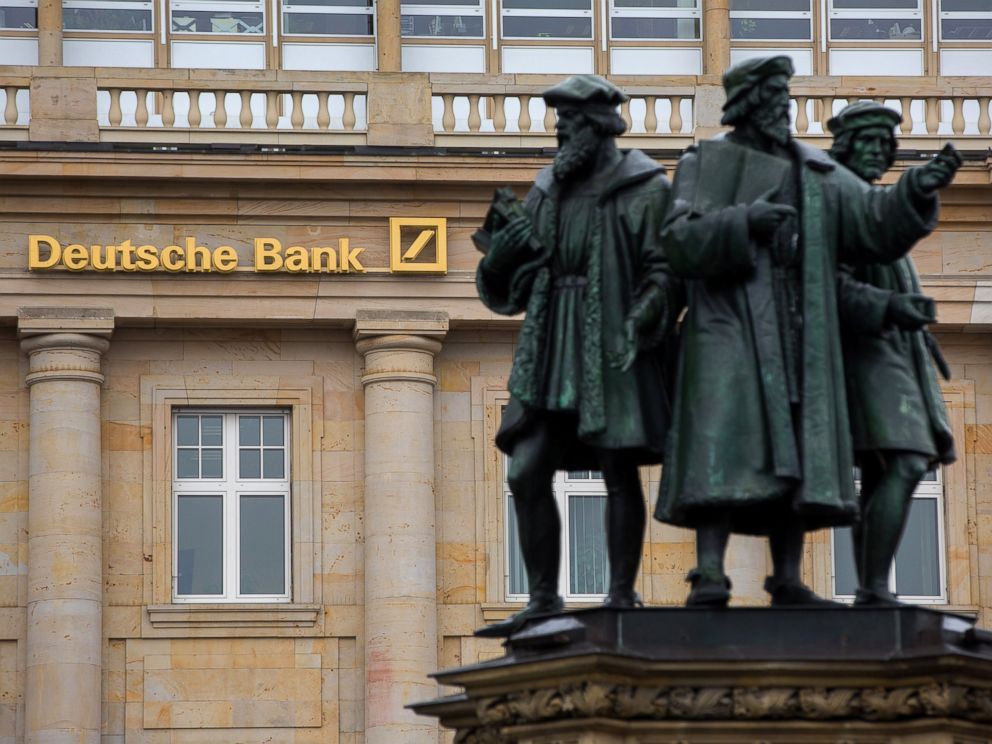 PHOTO: Statues stand outside a Deutsche Bank AG bank branch in Frankfurt, Germany, on Oct. 20, 2016.