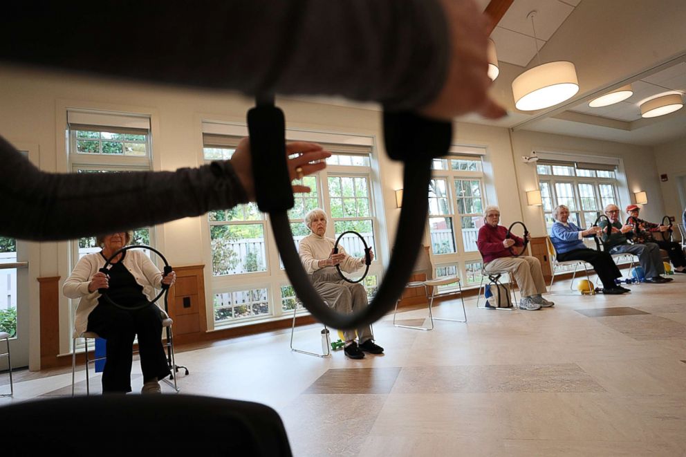 PHOTO: Senior citizens participate in an exercise class at the new Tolles Parsons Center in Wellesley, MA on Oct. 30, 2017. 