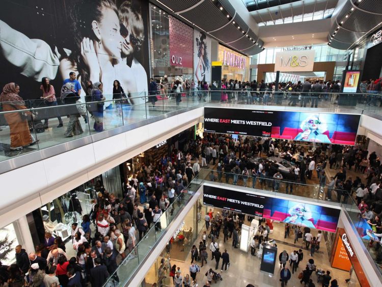 Shoppers crowd the walkways on opening day of the Westfield Stratford City shopping centre in east London