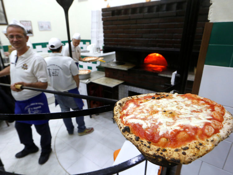 Pizza Margherita at L'Antica Pizzeria da Michele in Naples, Italy 