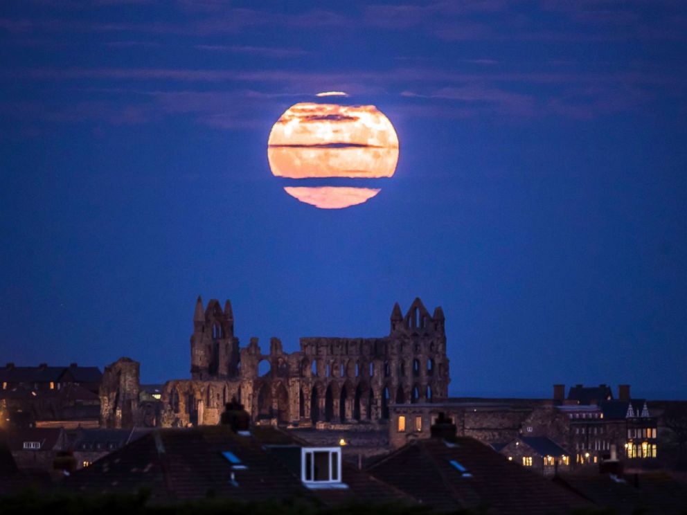 PHOTO: The Supermoon rises above Whitby Abbey in Whitby, north east England, Sunday Dec. 3, 2017.