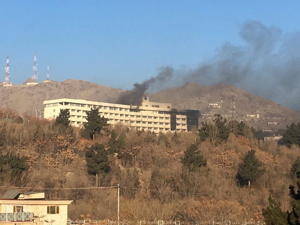 Smokes rises from the Intercontinental Hotel after an attack in Kabul, Afghanistan, Sunday, Jan. 21, 2018. Gunmen stormed the hotel in the Afghan capital on Saturday evening, triggering a shootout with security forces, officials said. (AP Photo/Rahma