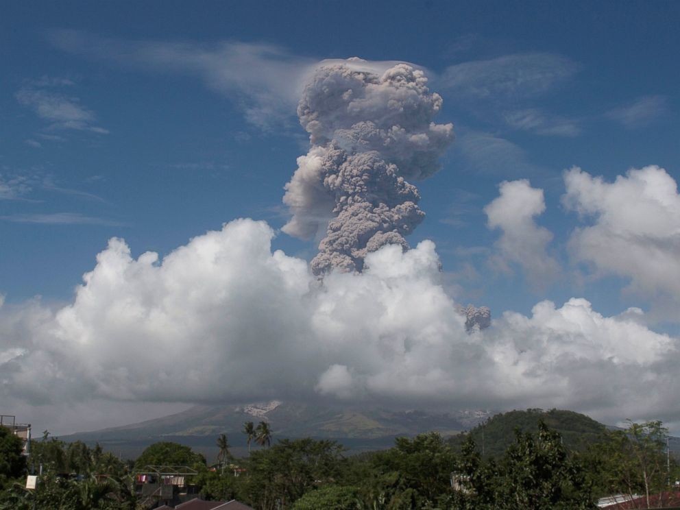 A huge column of ash shoots up to the sky during the eruption of Mayon volcano Monday, Jan. 22, 2018 as seen from Legazpi city, Albay province, around 340 kilometers (200 miles) southeast of Manila, Philippines. The Philippines most active volcano e