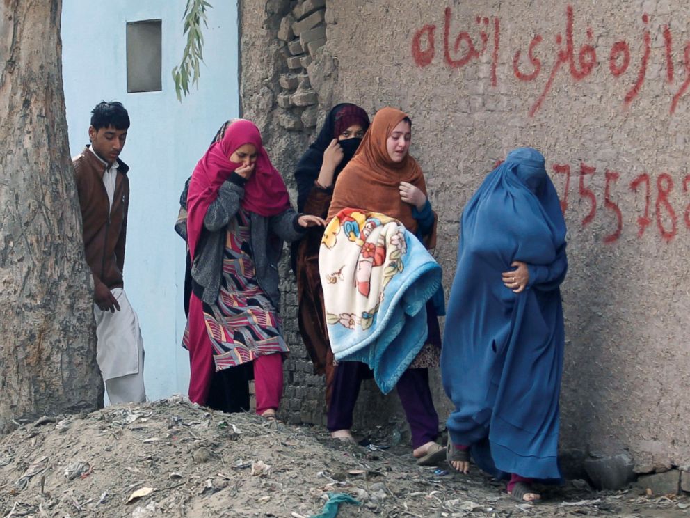 PHOTO: Afghan women leave the site of a blast in Jalalabad, Afghanistan, Jan. 24, 2018.
