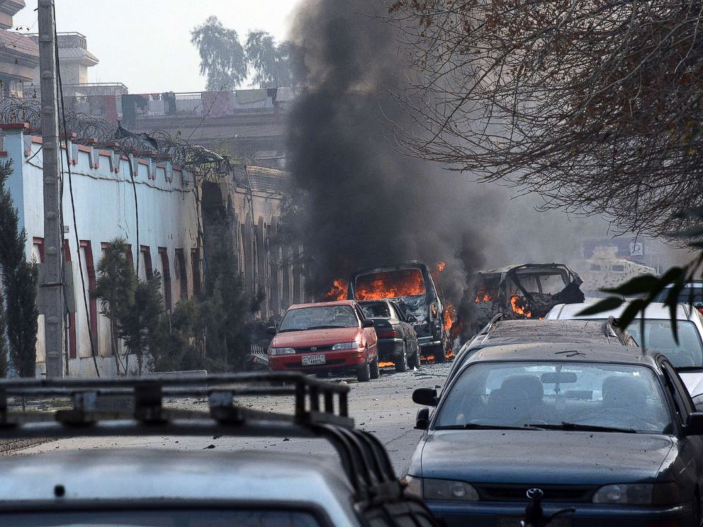 PHOTO: Vehicles burn after a deadly attack in Jalalabad, Afghanistan, Jan. 24, 2018
