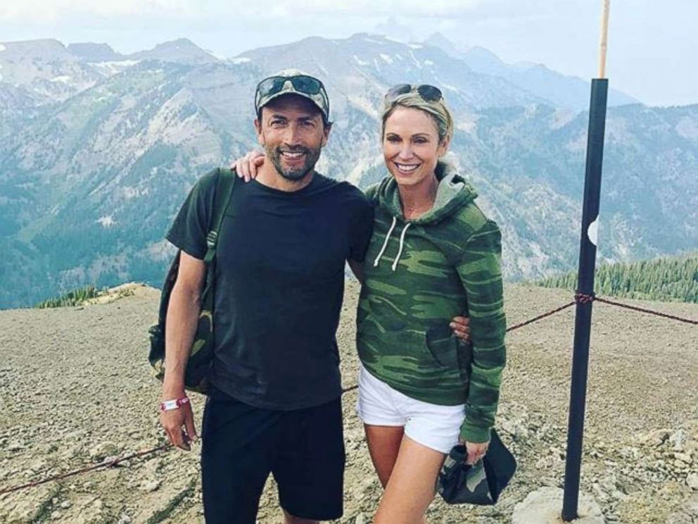 PHOTO: Amy Robach poses with her husband, Andrew Shue.