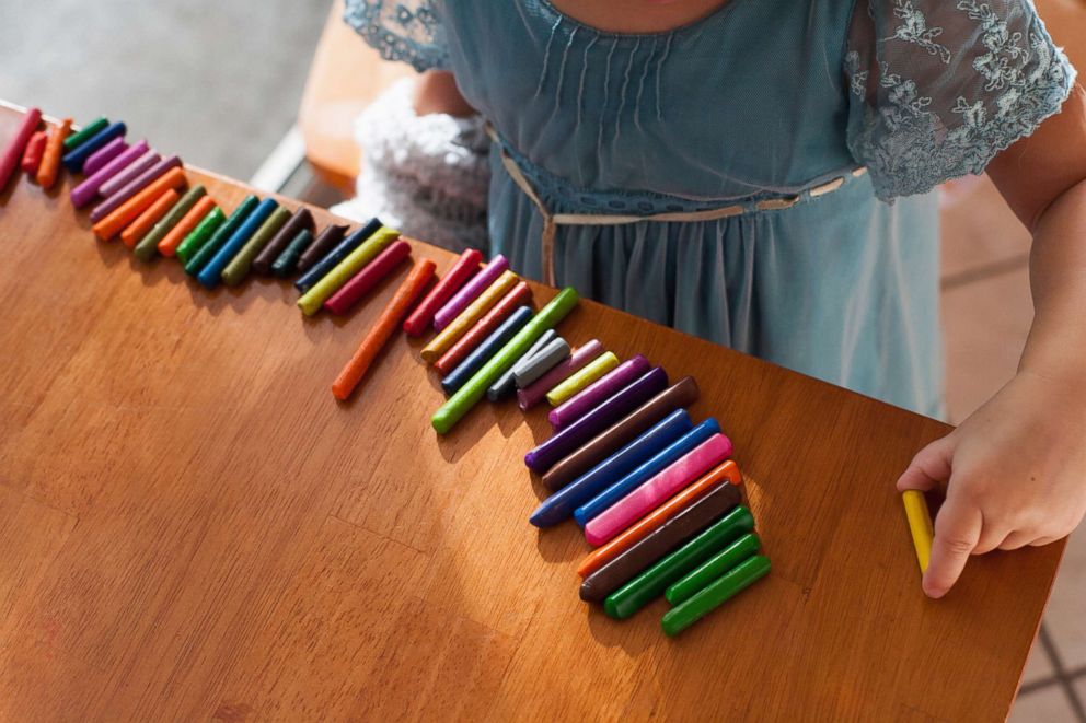 PHOTO: A girl plays with crayons in an undated stock photo. 