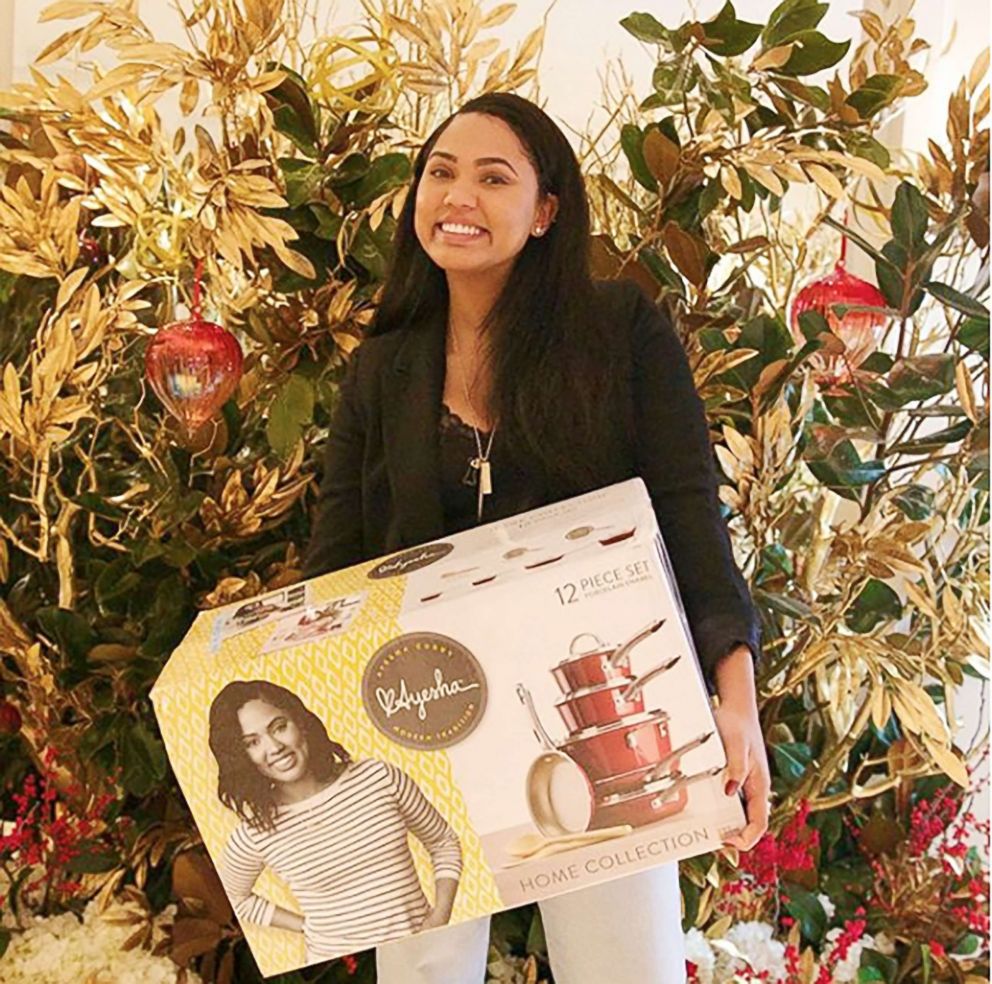 PHOTO: Ayesha Curry poses with her cookware set.