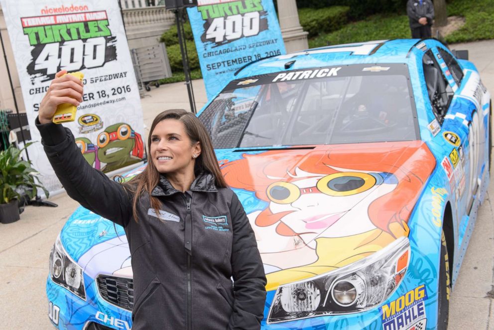 PHOTO:Danica Patrick shooting a selfie at the Nickelodeon And Chicagoland Speedway press conference to announce the Teenage Mutant Ninja Turtles 400 Race at Wrigley Square at Millenium Park on April 26, 2016 in Chicago, Ill. 