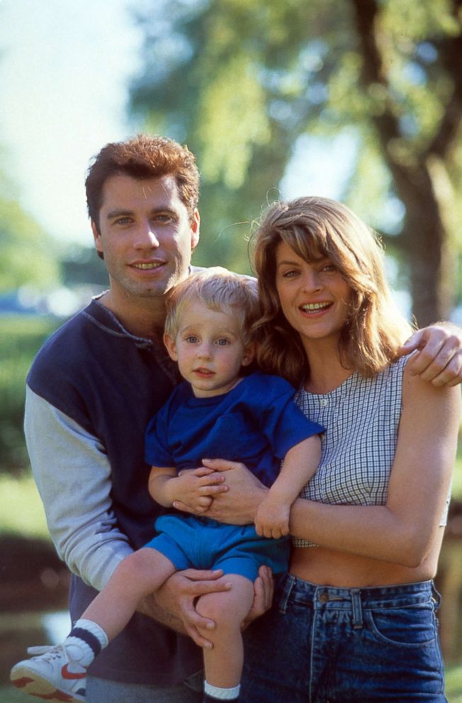 PHOTO: John Travolta and Kirstie Alley holding a child in a scene from the film Look Whos Talking, 1989. 