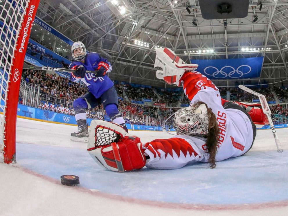 PHOTO: American Jocelyne Lamoureux-Davidson scores a game winning goal against goalie Shannon Szabados of Canada, in the penalty shootout during the womens gold medal hockey game, Feb. 22, 2018. 