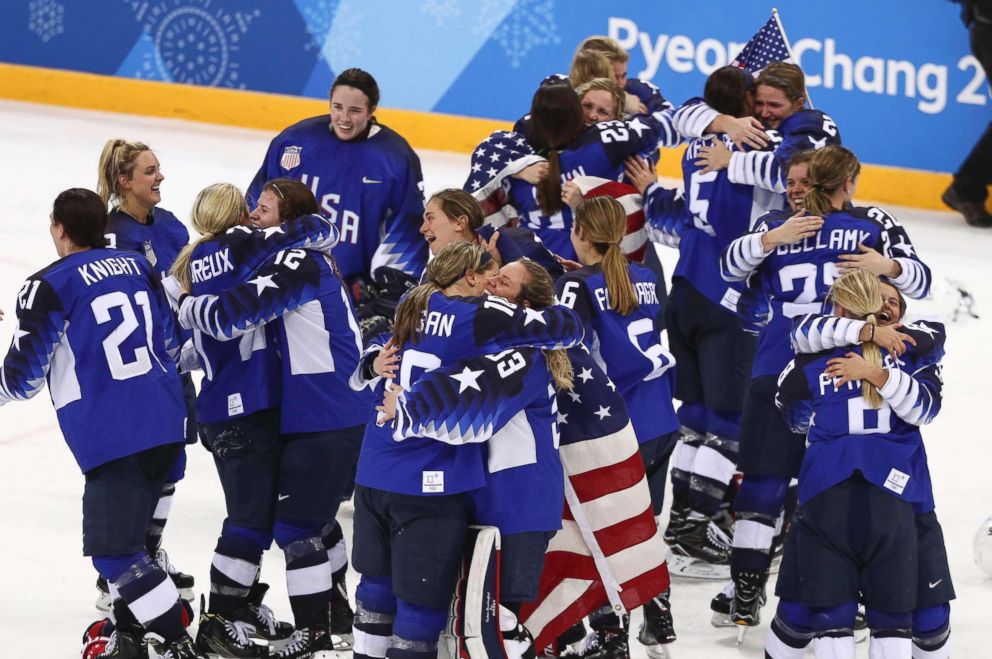 PHOTO: Members of the The United States womens hockey team celebrate after defeating Canada 3-2 in a shootout to win the gold medal game, Feb. 22, 2018.
