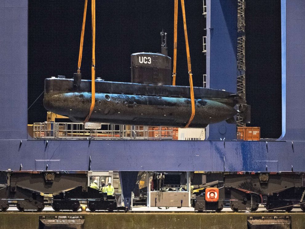 PHOTO: The submarine UC3 Nautilus is lifted onto a block truck from the salvage ship Vina with the help of a container crane in Copenhagens Harbor, Denmark,August 12, 2013.