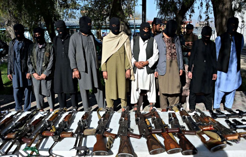 PHOTO: Alleged Taliban fighters and other militants stand handcuffed while being presented to the media at police headquarters in Jalalabad, Afghanistan on March 6, 2018.