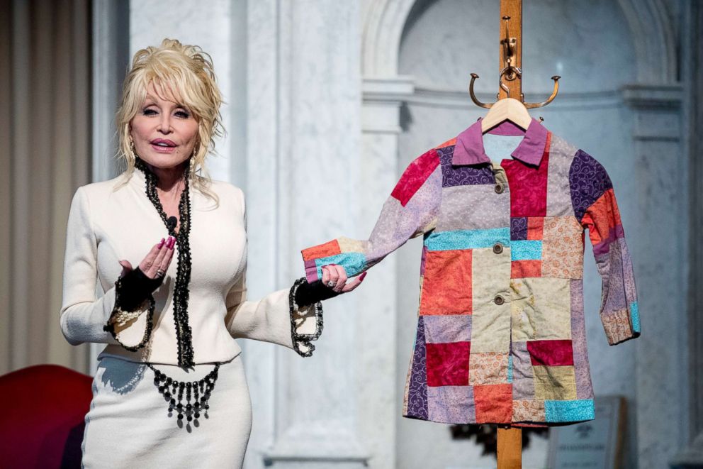 PHOTO: Dolly Parton speaks at an event where her organization, Imagination Library, donates the 100 millionth book, Dolly Partons Coat of Many Colors, to the Library of Congress collection, Feb. 27, 2018 in Washington.