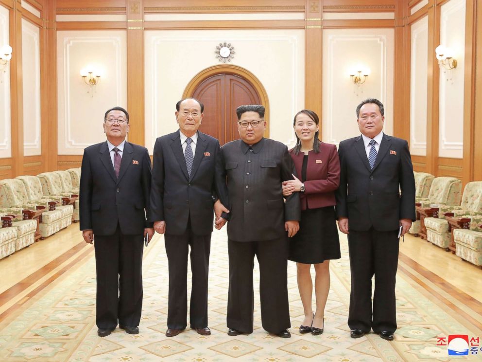 PHOTO: In a handout photograph released by the North Korean News Agency, North Koreas Kim Jong-un, center is shown with members of the high-level delegation, including his sister, Kim Yo-jong, who visited South Korea to attend the 2018 Winter Olympics.