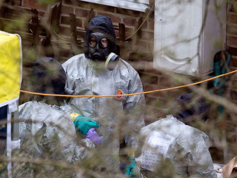 PHOTO: A team believed to be from the Organisation for the Prohibition of Chemical Weapons inspects the back garden of house on the road where former Russian spy Sergei Skripal lived in Salisbury Wiltshire, Britain, March 22, 2018.