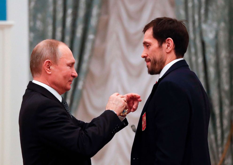 PHOTO: Russian President Vladimir Putin decorates Russian ice hockey player and gold medalist of the 2018 Pyeongchang Winter Olympic Games Pavel Datsyuk with the Order of Friendship during an award ceremony at the Kremlin in Moscow, Feb. 28, 2018.