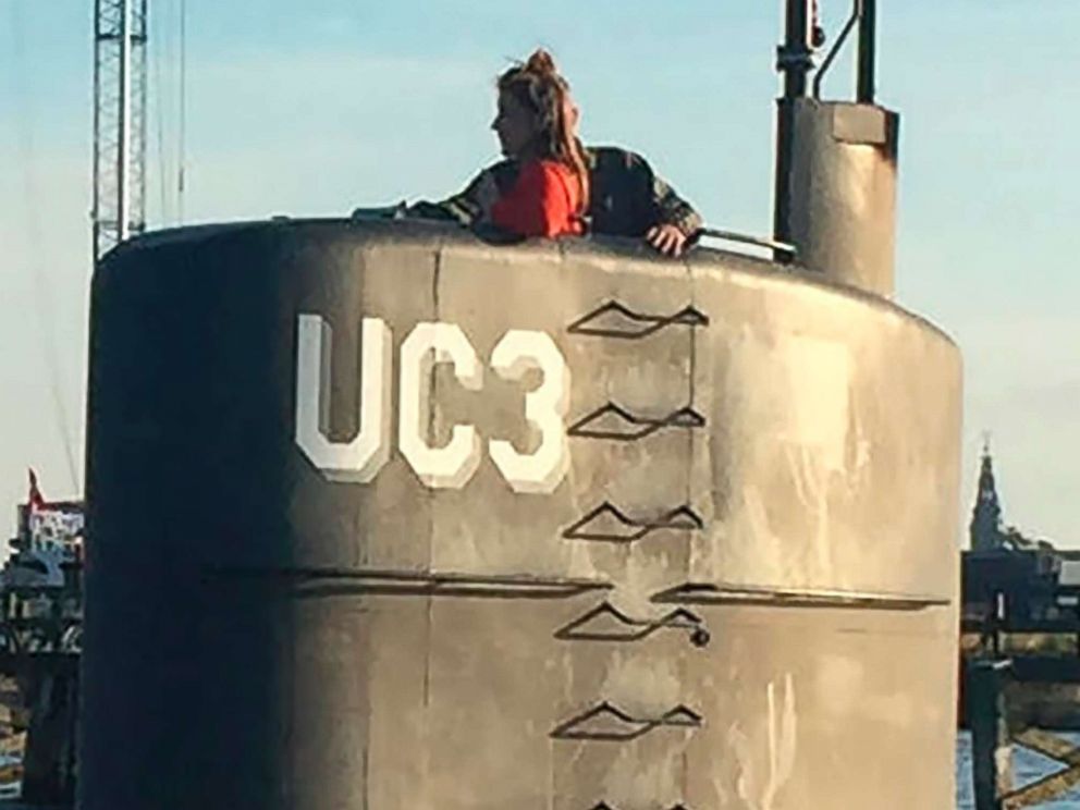 PHOTO: Swedish journalist Kim Wall is seen standing in the tower of the private submarine UC3 Nautilus in Copenhagen Harbor.