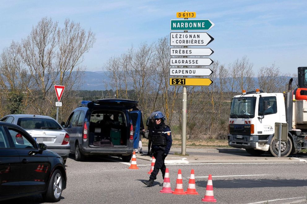 PHOTO: French police block the access to Trebes, where a man took hostages at a supermarket, March 23, 2018 in Trebes, France. 