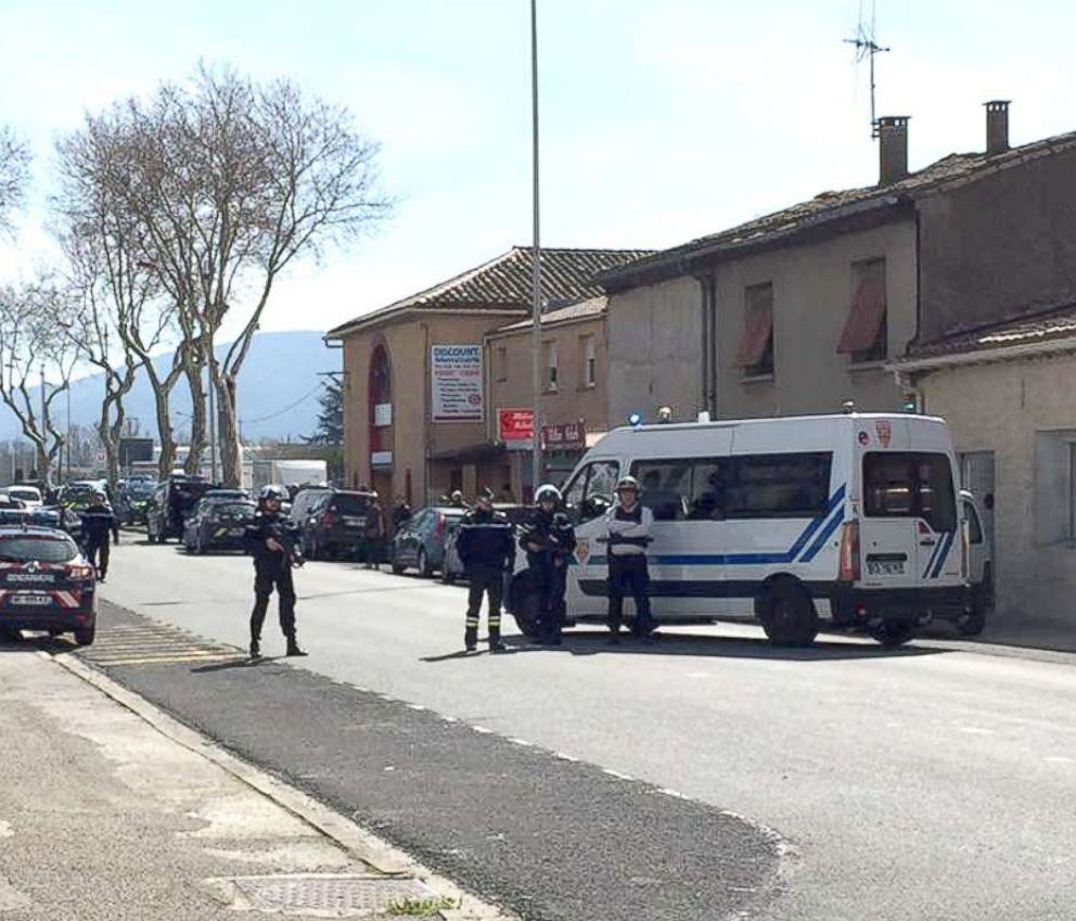PHOTO: Police are seen at the scene of a hostage situation in a supermarket in Trebes, France, March 23, 2018, in this picture obtained from a social media video. 