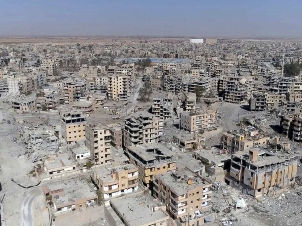 PHOTO: This Oct. 19, 2017 made from drone video shows damaged buildings in Raqqa, Syria two days after Syrian Democratic Forces said that military operations to oust the Islamic State group have ended.