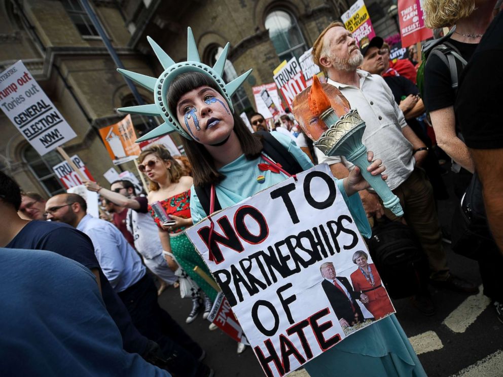 PHOTO: A protester takes part in a demonstration against President Trumps visit to the U.K., near Portland Place on July 13, 2018 in London.