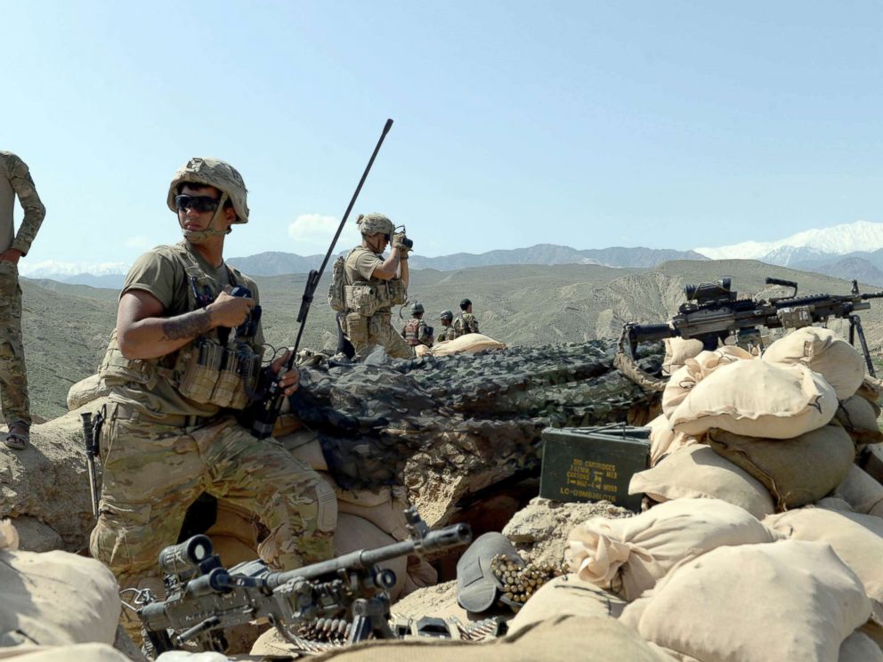 PHOTO: In this photograph taken on April 11, 2017, US soldiers take up positions during an ongoing an operation against Islamic State (IS) militants in the Achin district of Afghanistans Nangarhar province.